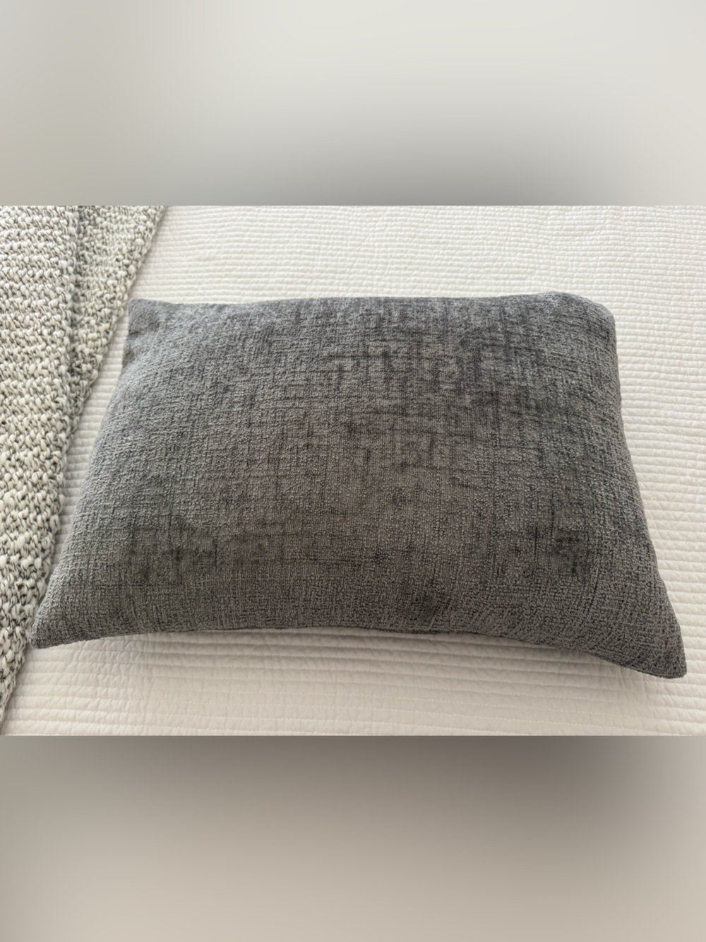 Gray Textured Throw Pillow - Stylish Home Accent. Measures 23” x 16”.